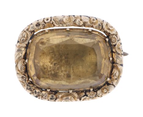 An Antique Georgian citrine brooch, circa 1820, oval form, cut-down collet set with foil-back oval mixed-cut citrine, within 