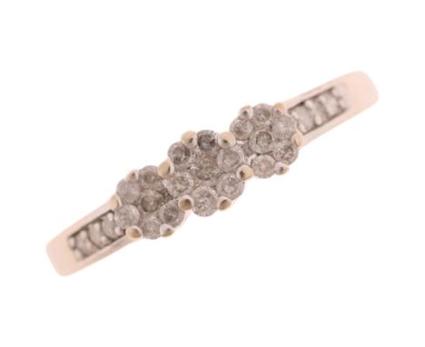 A modern 9ct white gold diamond triple flowerhead cluster ring, set with modern round brilliant-cut diamonds, setting height 