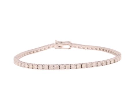 A 9ct white gold 5.08ct diamond tennis line bracelet, maker MK, claw set with modern round brilliant-cut diamonds, colour app