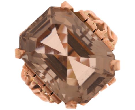 A Middle Eastern rose gold smoky quartz dress ring, set with octagonal step-cut smoky quartz, mount tests as approx 12ct gold
