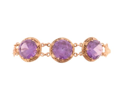 A Middle Eastern 14ct gold colour change blue synthetic sapphire panel bracelet, in the Egyptian style, setting height 18.4mm