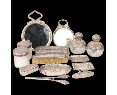 A quantity of Victorian and Edwardian silver 'Cherub' and 'Reynolds Angel's Heads' dressing table items, including pair of to