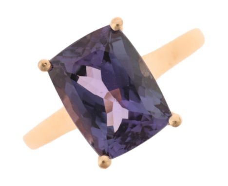 A 9ct gold single stone tanzanite dress ring, maker R&C, set with rectangular cushion-cut tanzanite, setting height 11.3mm, s