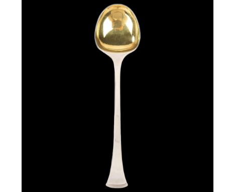 HANS HANSEN - a Danish modernist sterling silver Kristine pattern serving spoon, plain stylised form with gilded bowl, 20.5cm