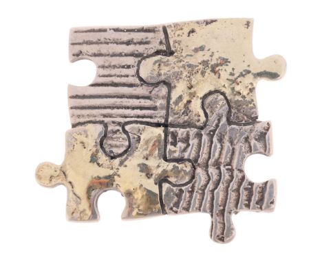 A LEODARAKIS - a Greek sterling silver and 18ct gold 'Puzzle' brooch/pendant, 47.6mm, 15.4gNo damage or repair, only light su