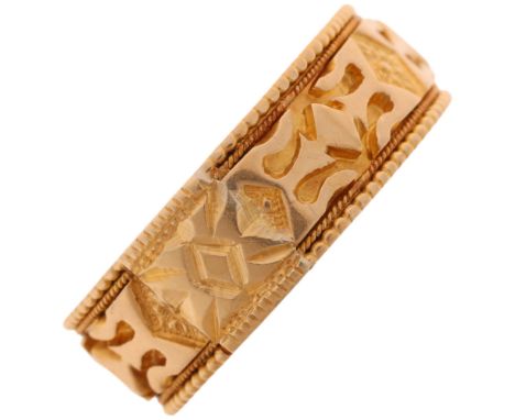 An Antique Victorian 18ct gold keeper band ring, no maker, Birmingham 1891, with relief and chased decoration and beaded edge