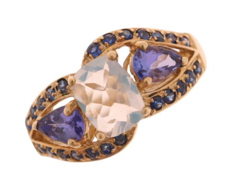 A 9ct gold opal tanzanite and sapphire dress ring maker TJC, set with oval mixed-cut opal with pear-cut tanzanite and round-c