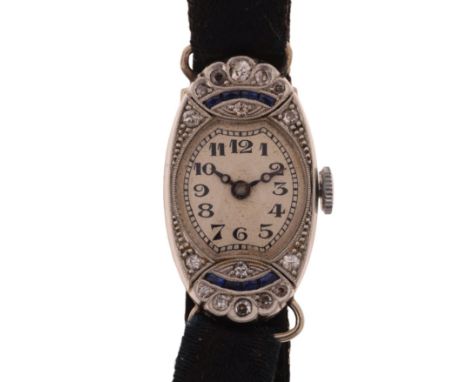 A lady's Art Deco platinum sapphire and diamond mechanical cocktail wristwatch, circa 1930s, silvered dial with black Arabic 