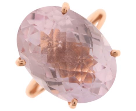 A 9ct rose gold pink kunzite dress ring, set with oval rose-cut kunzite, setting height 18mm, size N, 4.8gNo damage or repair