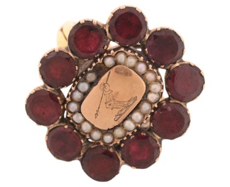 An Antique Georgian flat-top garnet split pearl mourning cluster ring, circa 1820, the central panel engraved with crest of a