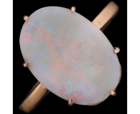 A 9ct gold single stone opal dress ring, unmarked mount tests as 9ct, setting height 16.7mm, size L, 2.5gOpal has a fair play