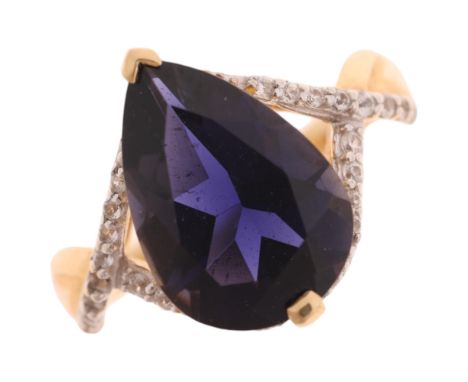 A 9ct gold tanzanite and cubic zirconia dress ring, maker R&C, set with pear-cut tanzanite and round-cut cubic zirconia, sett