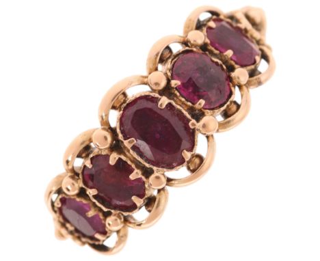 An Antique Georgian five stone ruby half hoop ring, circa 1820, set with 5 graduated oval mixed-cut rubies within openwork be