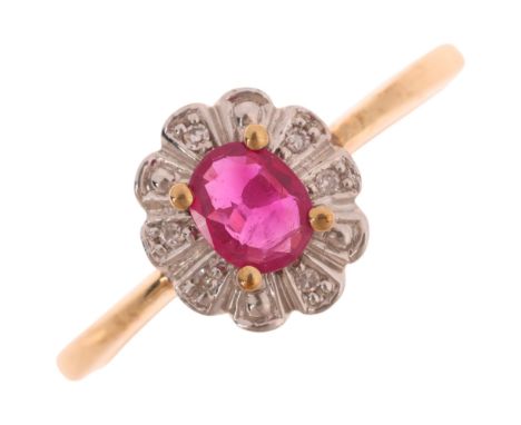 A 9ct gold ruby and diamond oval cluster ring, set with oval mixed-cut ruby and single-cut diamonds, setting height 9.3mm, si