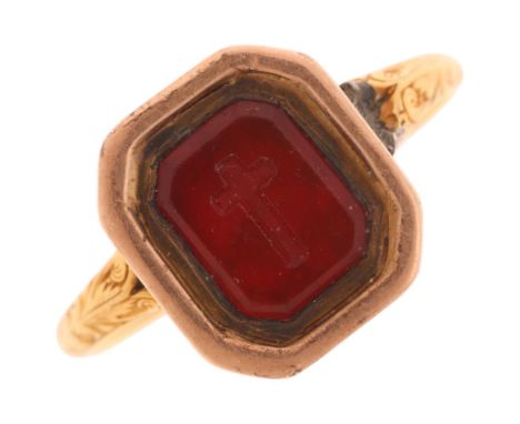 An Antique Victorian carnelian 'Cross' seal ring, the octagonal intaglio carved with religious cross symbol, in closed-back s