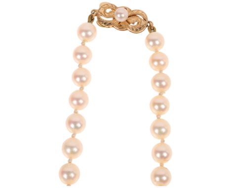 MIKIMOTO - a Vintage 14ct gold single-strand graduated cultured pearl bead necklace, pearls ranging from 9.2 - 5.9mm, stamped