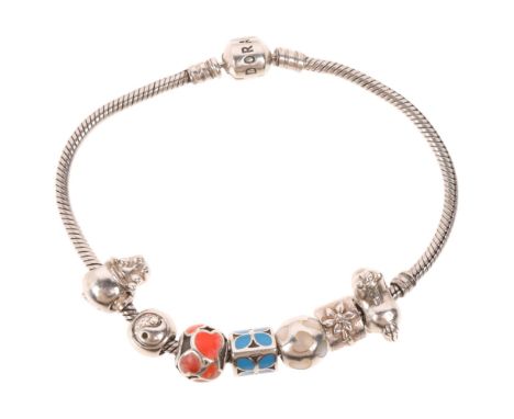PANDORA - a sterling silver snake link charm bracelet, with 7 silver charms, 21cm, 40.7gNo damage or repair, only light surfa