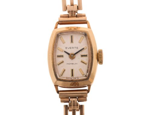 EVERITE - a lady's 9ct gold mechanical bracelet watch, circa 1960s, silvered dial with applied gilt baton hour markers, baton