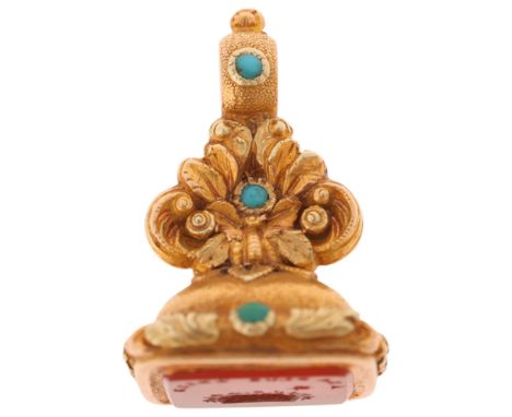 An Antique Georgian Regency hardstone seal fob, circa 1820, set with intaglio carved carnelian, bearing motto "A La Plus Bell