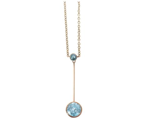 An Antique Edwardian 14ct gold blue zircon pendant necklace, on integral 14ct fine cable link chain, unmarked mount tests as 