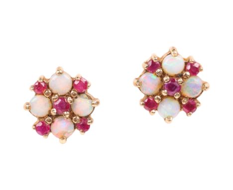 A pair of 9ct gold ruby and opal cluster stud earrings, London 1999, 10.5mm, 2.3gAll stones present, 2 opals have chips and c