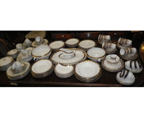 A BLUE AND GILT DECORATED PART DINNER SERVICE, together with a further quantity of tea and dinner wares