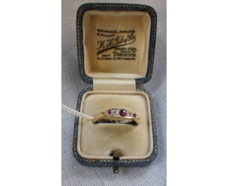 A RUBY AND DIAMOND RING on 18ct gold shank