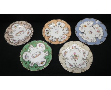 A HARLEQUIN SET OF CERAMIC PLATES with floral decoration and varied borders