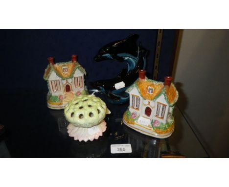 A ROYAL WORCESTER POSY VASE, two Staffordshire cottages and a Poole dolphin