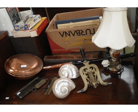 TWO POLISHED AND PIERCED NAUTILUS SHELLS from Sandeman Islands, a collection of metalware and a lamp