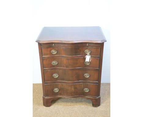 A Georgian style serpentine front chest, fitted a brushing slide above four long graduated drawers, bracket feet, 71 x 49 x 8