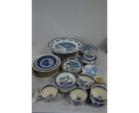 A Wedgwood 'Willow' pattern part tea service; together with other blue and white plates; and a Chinese style teacup.