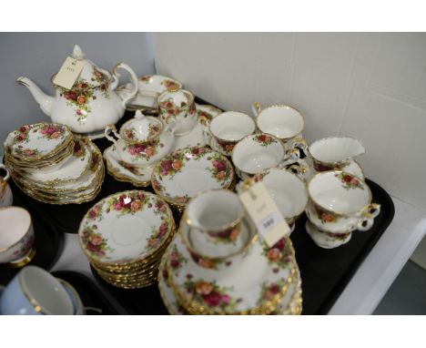 A Royal Albert 'Old Country Roses' tea services, including: teacups, saucers, plates, dishes, sugar bowls, preserve pot, teap