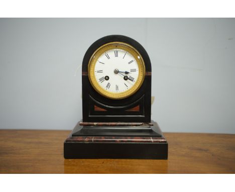 A late Victorian slate and marble cased mantel clock, with white enamel roman dial, fitted barrel movement striking on a bell