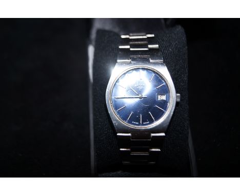 Vintage rotary manual wind wristwatch with blue dial, date app at 3 o clock 