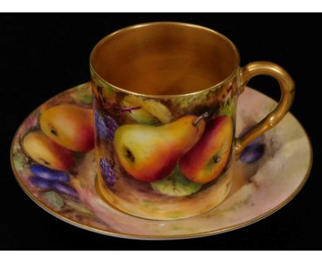 A 20thC Royal Worcester porcelain cabinet cup and saucer, 1925, by Reginald Austin, handpainted with autumnal fruits, printed