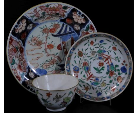 A Chinese Republic porcelain tea bowl, polychrome decorated with exotic bird and flowers, predominately in orange, pink and g