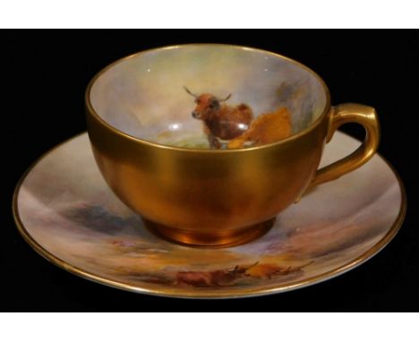 A 20thC Royal Worcester porcelain tea cup and saucer, 1921, by Harry Stinton, handpainted with highland cattle, with gilt hig
