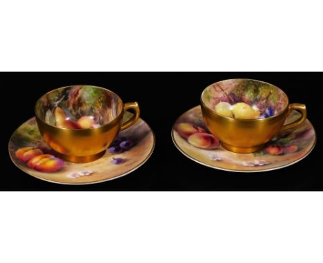 An early 20thC Royal Worcester fruit pattern cup and saucer, by William Ricketts, each piece decorated with autumn fruits, pe