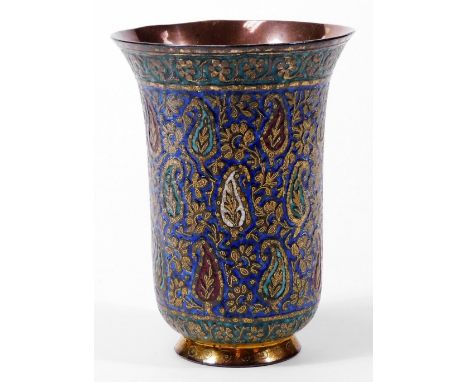 A 19thC Persian enamel and gilt metal beaker, with gilt coloured wirework floral decoration, on  a blue ground with an upper 