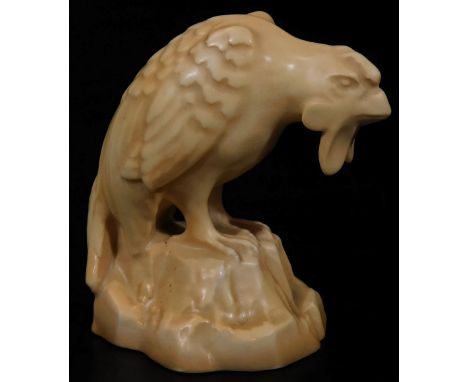 An early 20thC Royal Worcester blush ivory eagle candle snuffer ornament, 1916, printed marks beneath, 9cm H.