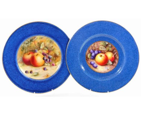 A matched pair of 20thC Royal Worcester fruit pattern cabinet plates, 1922, by William Bee and Hilda Everett, with differing 