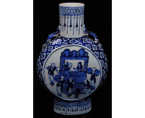 A 19thC Chinese blue and white porcelain moon flask, of large proportion, with cylindrical stem, the circular body profusely 