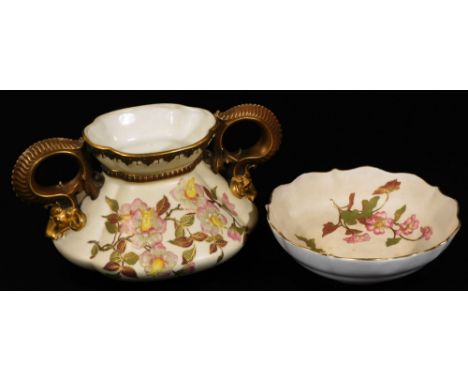 A late 19thC Royal Worcester porcelain two handled vase, of shaped form, with dragon handles, decorated with posies, with gil