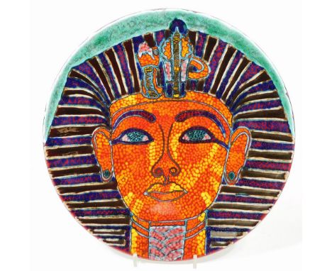 A Poole pottery Tutankhamun charger, decorated in a vivid palette with the image of the Boy King, signed Nicky Masserella, Po