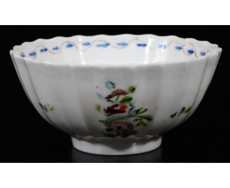 A late 18thC Pinxton porcelain fluted bowl, decorated in a New Hall type pattern, unrecorded, marked with impressed letter E,