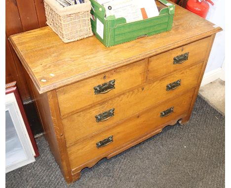 An oak chest of drawers