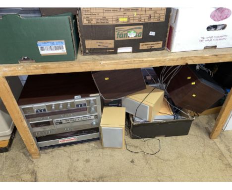 Shelf of mixed Hi-Fi systems and speakers