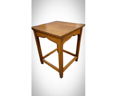 A Robert Mouseman Thompson of Kilburn ecclesiastical square top table, with square legs and carved mouse to leg, inscribed 'I
