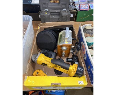 A Roberts RD-5 radio, a Bose digital music system and a DeWalt grinder tool